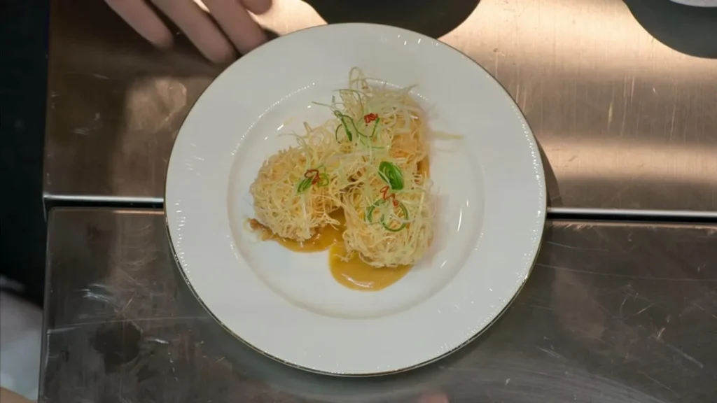 penyajian-mala-cream-dimsum-culinary-class-wars.webp <img loading=